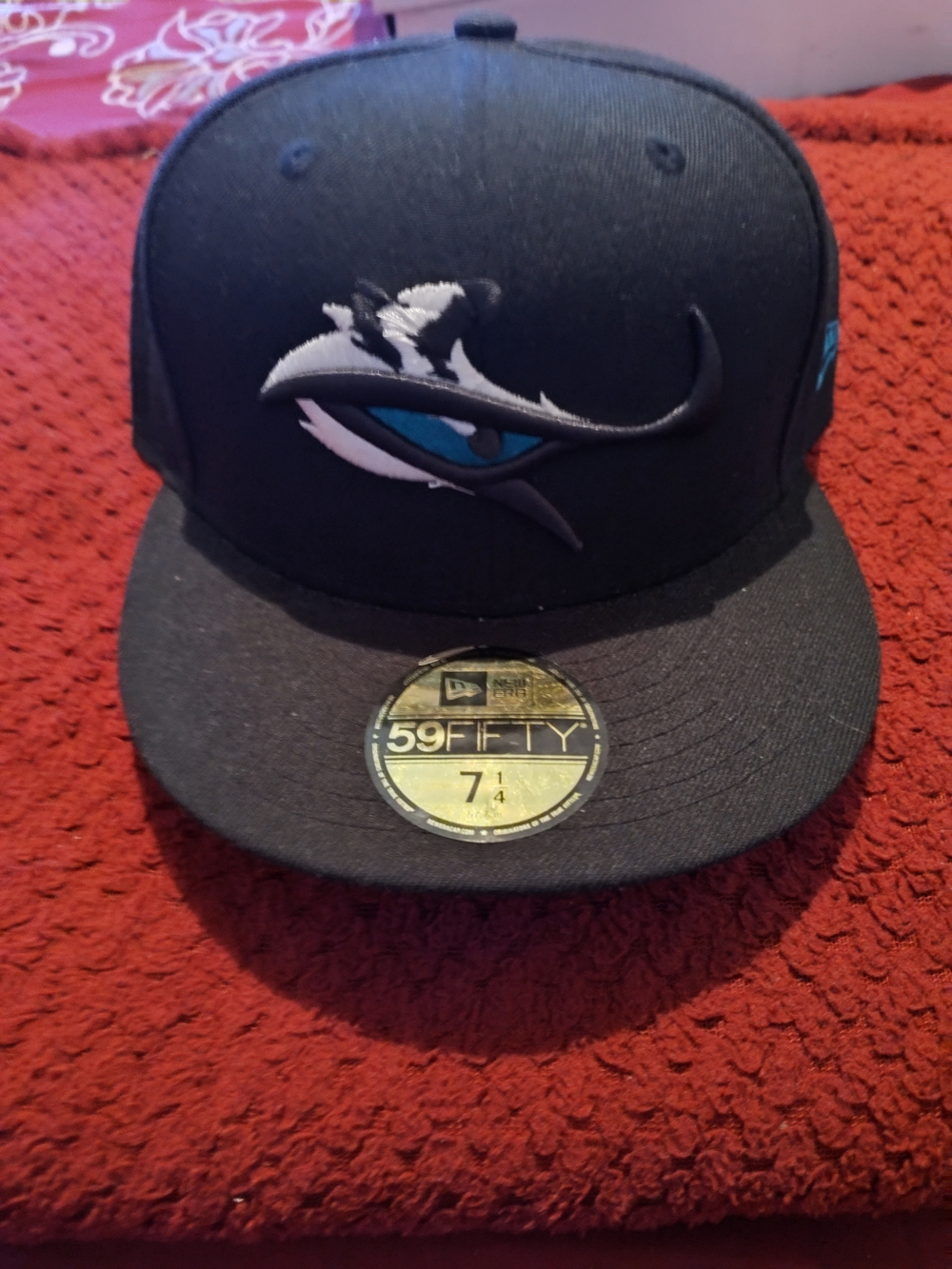 New Era Black Fitted Cap with Blue Eye Accent